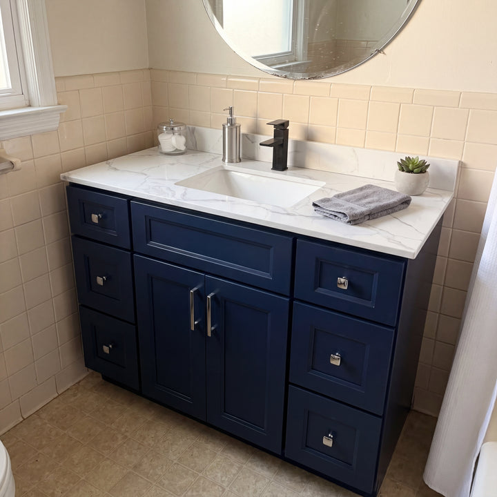 Tesoro 48" Blue Shaker vanity in a Canadian bathroom with gold fixtures