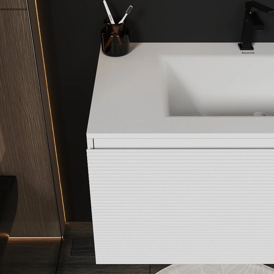 Aventino white engineered wood cabinet — straight-on view of drawer face