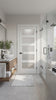 Frosted Glass 5-Panel Door shown in a modern bathroom
