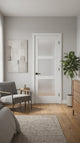 Frosted Glass 3-Panel Door shown in a modern room