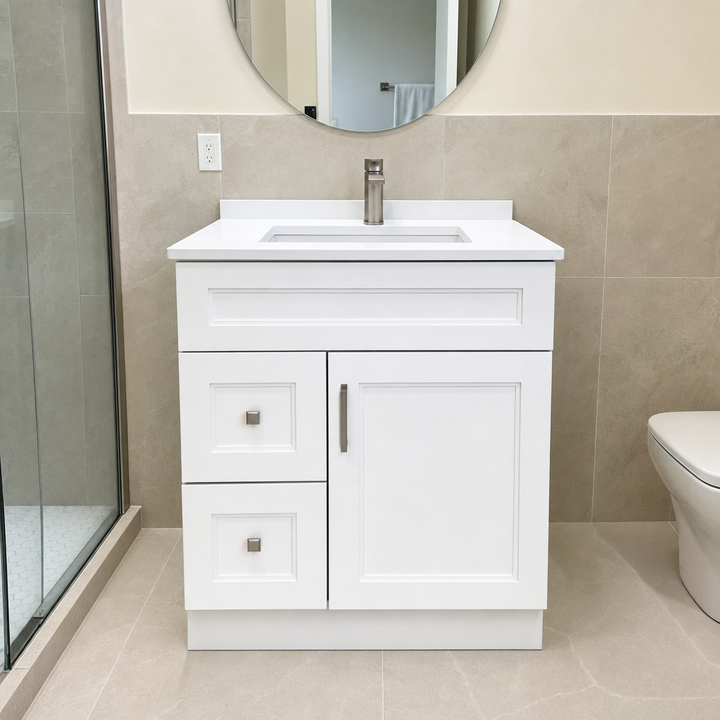 Tesoro 30-inch white Shaker solid wood bathroom vanity with brushed nickel handles in a tiled bathroom