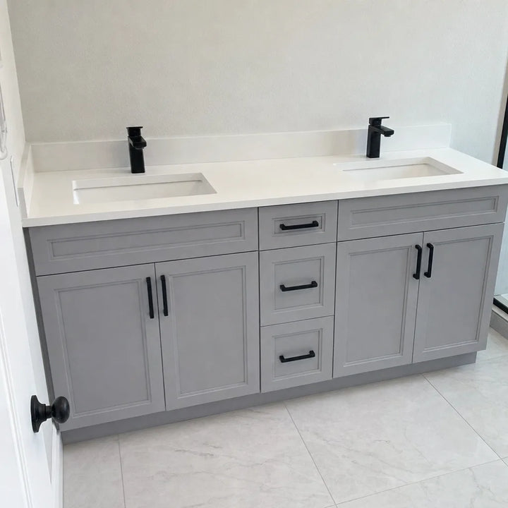 Tesoro 60-inch grey double sink Shaker solid wood bathroom vanity with black handles in a light and airy bathroom